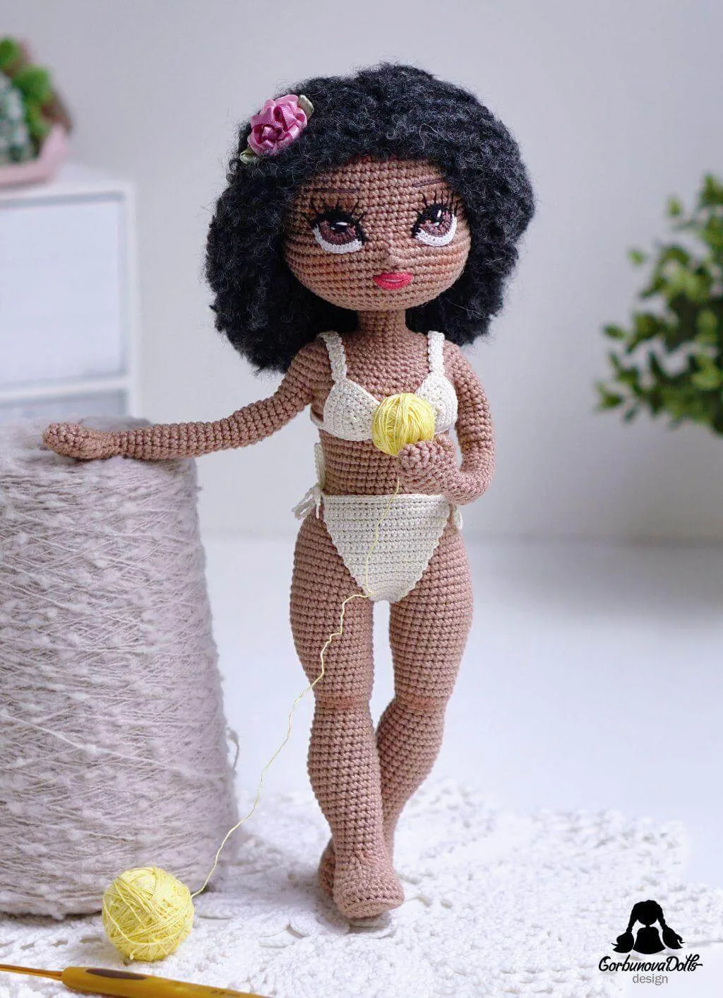 Dark-skinned Michelle crochet doll base wearing crocheted lingerie