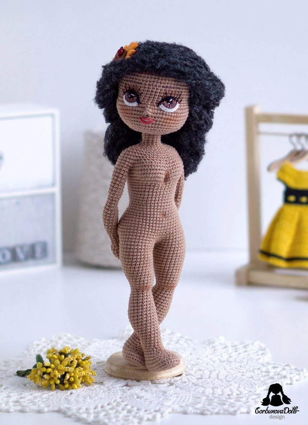 Dark-skinned crochet doll base Michelle without clothes, showing full crocheted body