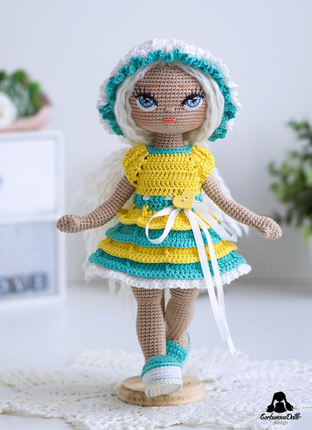 Crochet doll pattern with clothes - finished seamless amigurumi doll with no-sew body, removable outfit, and detailed crocheted eyes