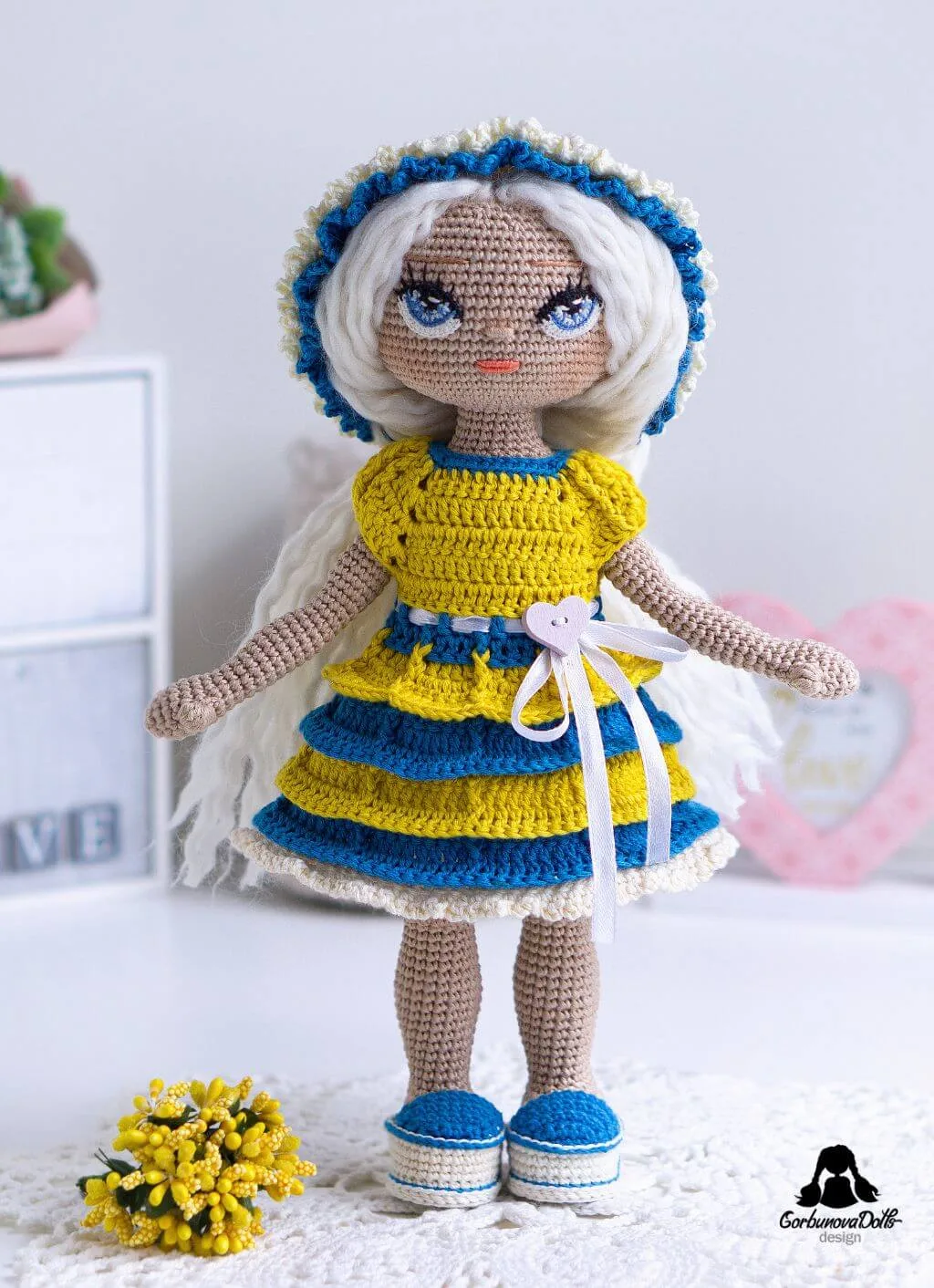 Crochet doll pattern with clothes - finished seamless amigurumi doll with no-sew body, removable outfit, and detailed crocheted eyes