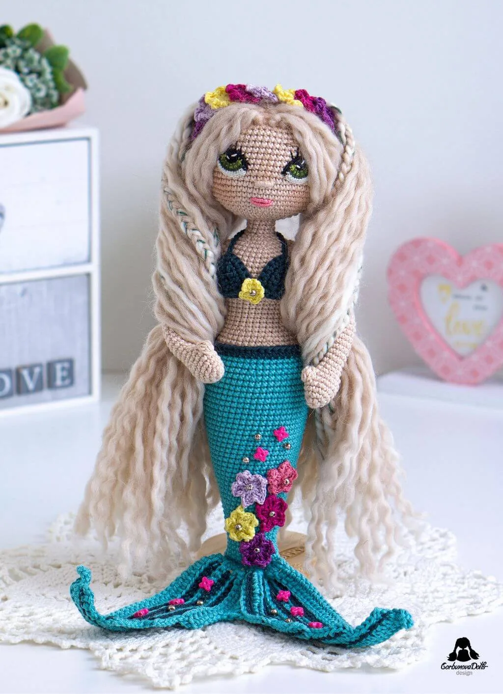 Mermaid crochet pattern - beautifully crafted seamless amigurumi mermaid doll in bikini top with detailed star decorations on her tail
