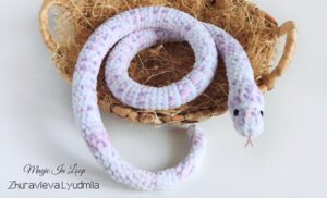 Finished amigurumi plush snake curled up - free crochet snake pattern project