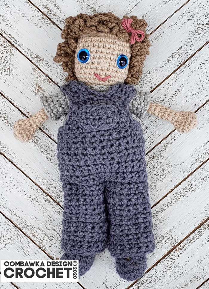 Sally crochet doll pattern with overalls curly hair and shoes