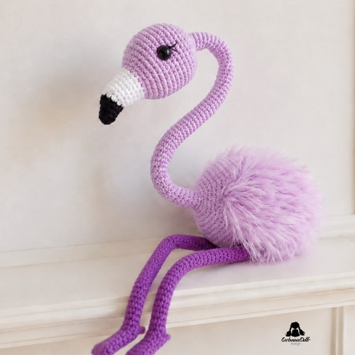 Crochet flamingo free amigurumi pattern – finished handmade purple flamingo toy